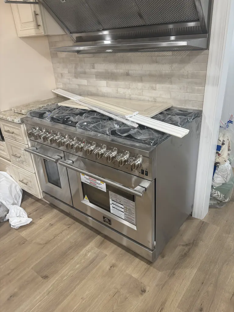 Six-burner gas range installed and connected