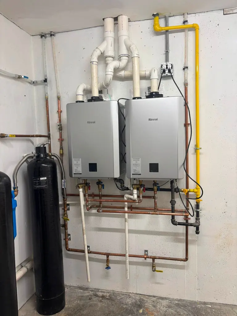 Two tankless water heaters with a new gas line